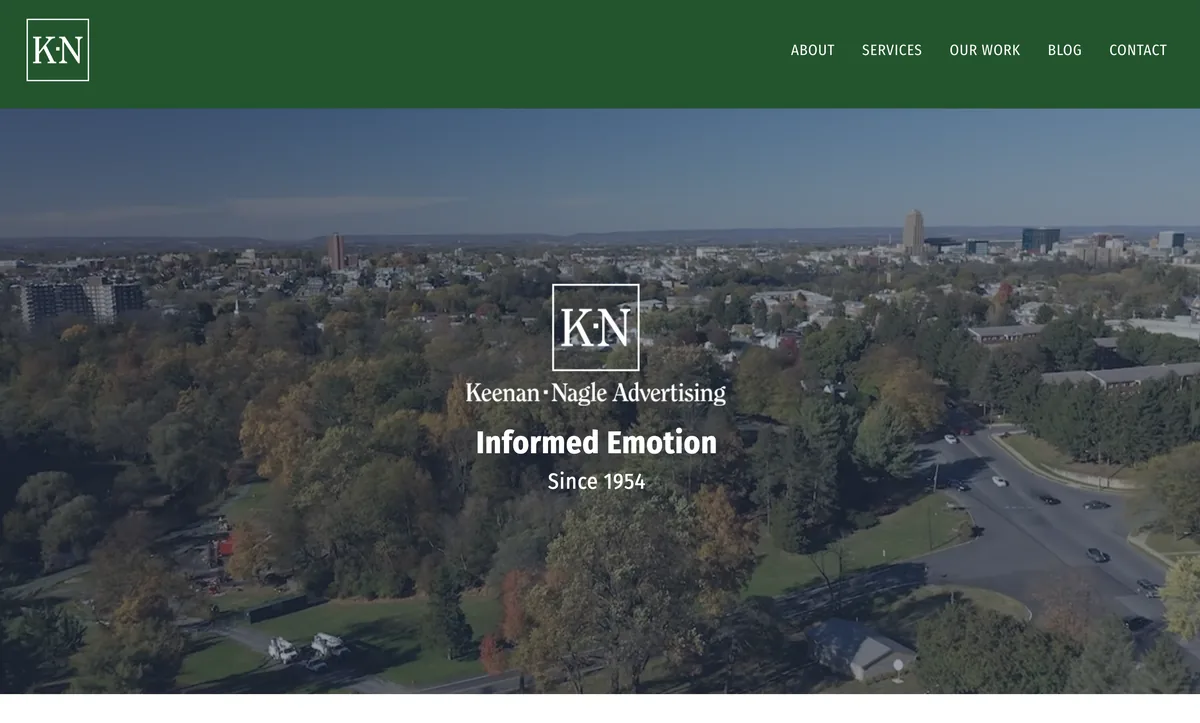 Keenan-Nagle Advertising homepage showing its logo over an aerial view of Allentown.